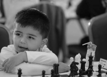 Чемпион Душанбе 2014 года по шахматам Джалолиддин Ильхоми (8 лет)