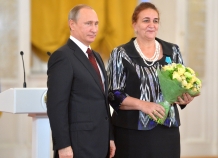 В. Путин вручил госнаграду России гражданке Таджикистана